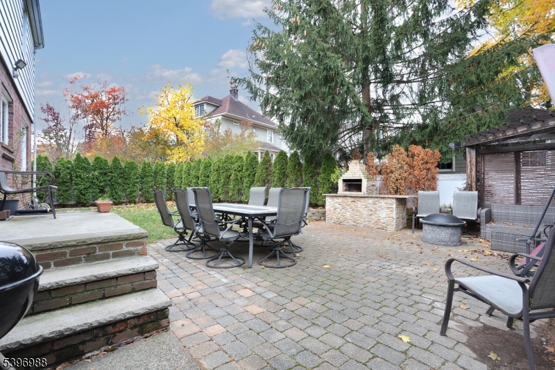 12 Pershing Avenue Ridgewood, NJ 07450 - Photo 39 of 42 a view of backyard with sitting area
