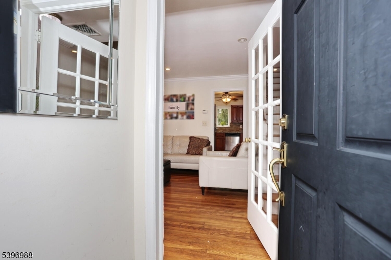 12 Pershing Avenue Ridgewood, NJ 07450 - Photo 5 of 42 a view of living room with furniture and wooden floor
