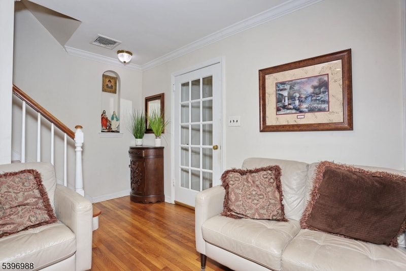 12 Pershing Avenue Ridgewood, NJ 07450 - Photo 9 of 42 a living room with furniture and a couch