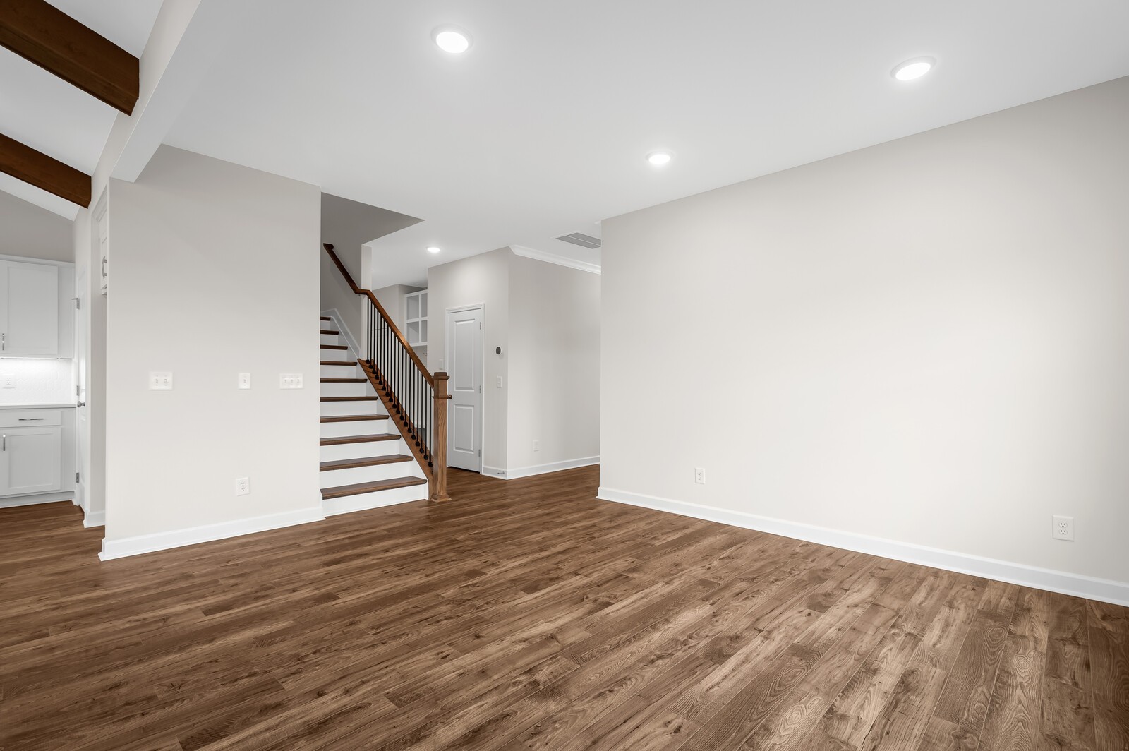 1733 Merkel Road Columbia, TN 38401 - Photo 16 of 53 a view of an empty room with wooden floor and stairs
