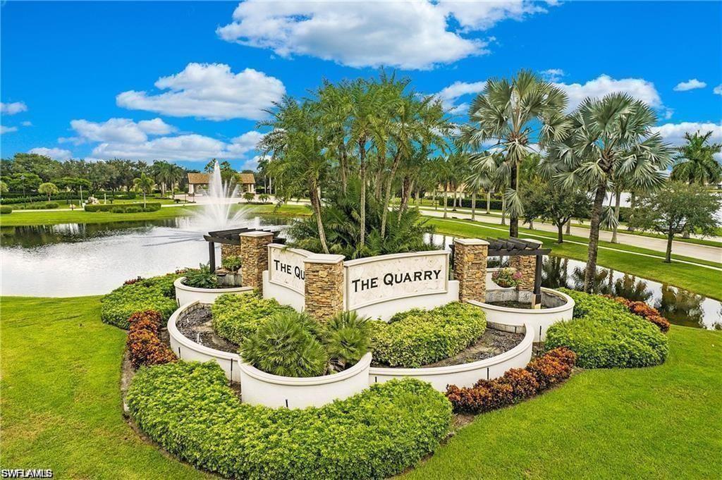 9525 Ironstone Terrace, Unit 102 Naples, FL 34120 - Photo 25 of 35 a view of a garden with an outdoor space