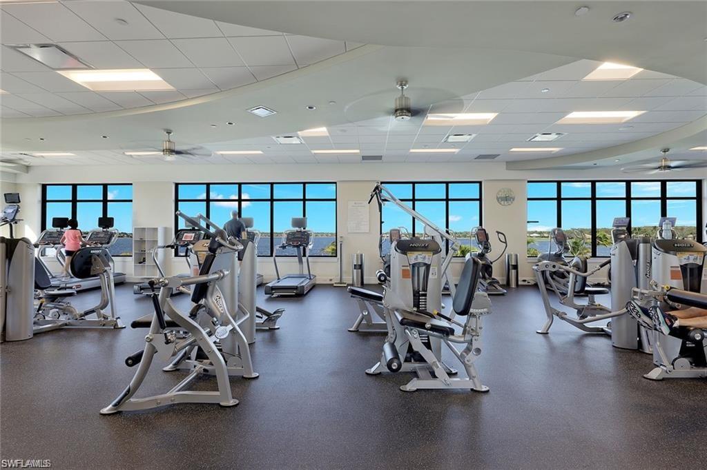 9525 Ironstone Terrace, Unit 102 Naples, FL 34120 - Photo 32 of 35 a view of a room with gym equipment
