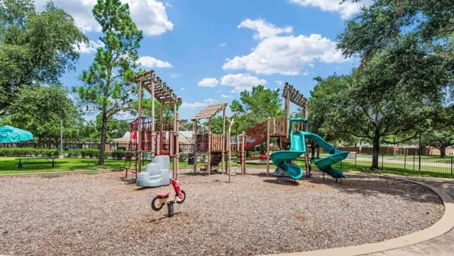 a park with lots of trees and entertaining space