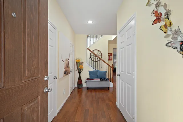 a view of entryway with wooden floor