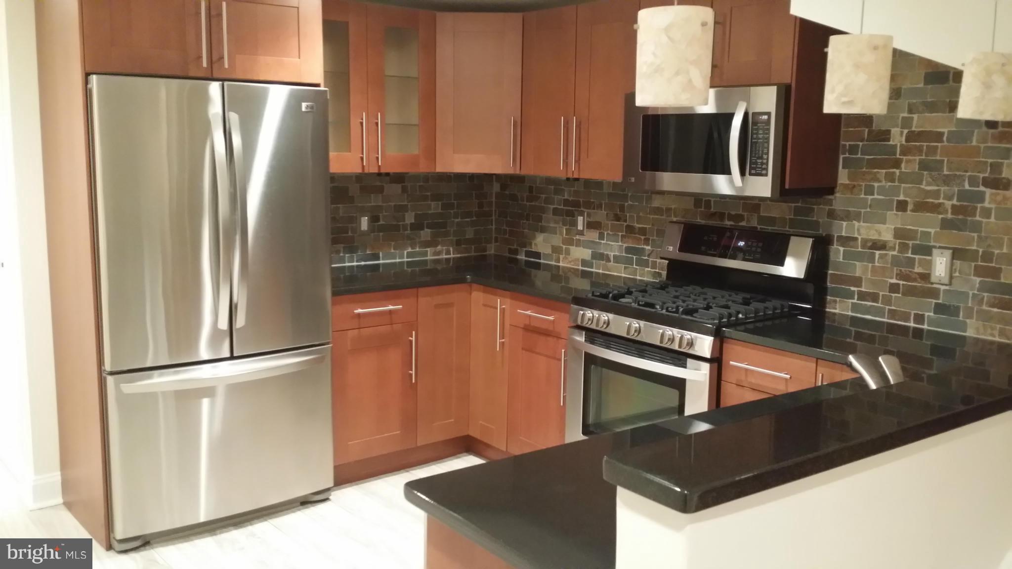 614 R Street Northwest Washington, DC 20001 - Photo 1 of 20 Basement Kitchen