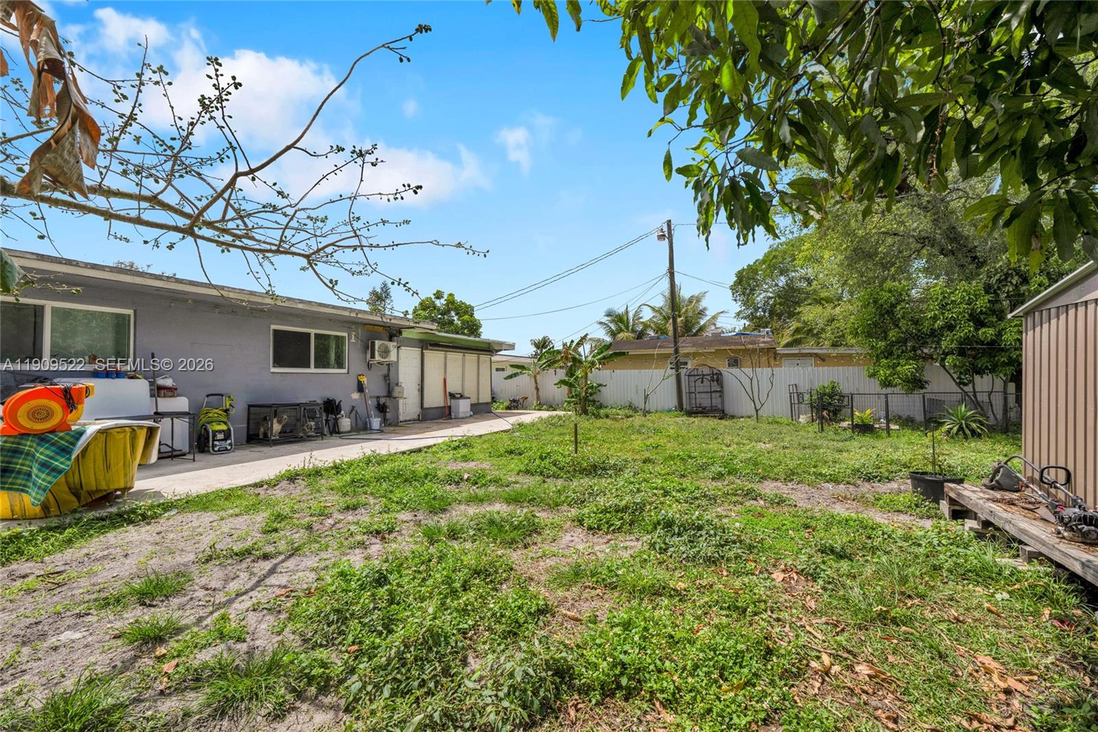 6221 Southwest 26th Street Miramar, FL 33023 - Photo 21 of 24 a view of a house with backyard and sitting area