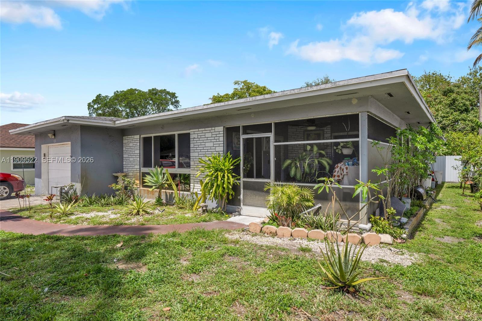 6221 Southwest 26th Street Miramar, FL 33023 - Photo 23 of 24 a view of outdoor space yard and patio