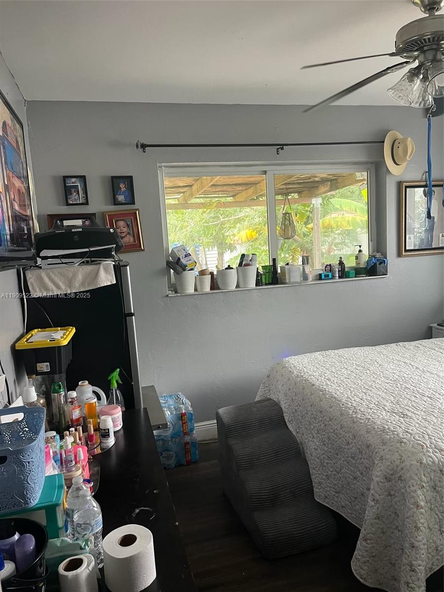 6221 Southwest 26th Street Miramar, FL 33023 - Photo 3 of 12 a living room with furniture and a large window