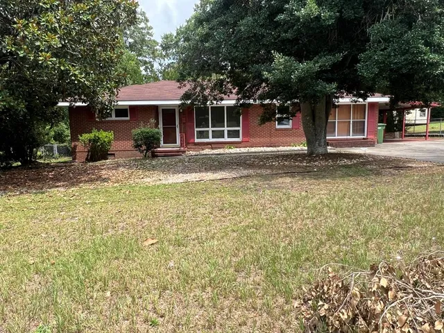 a front view of a house with a porch