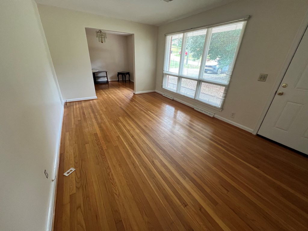 3447 Montecello Drive Columbus, GA 31906 - Photo 2 of 11 a view of empty room with wooden floor