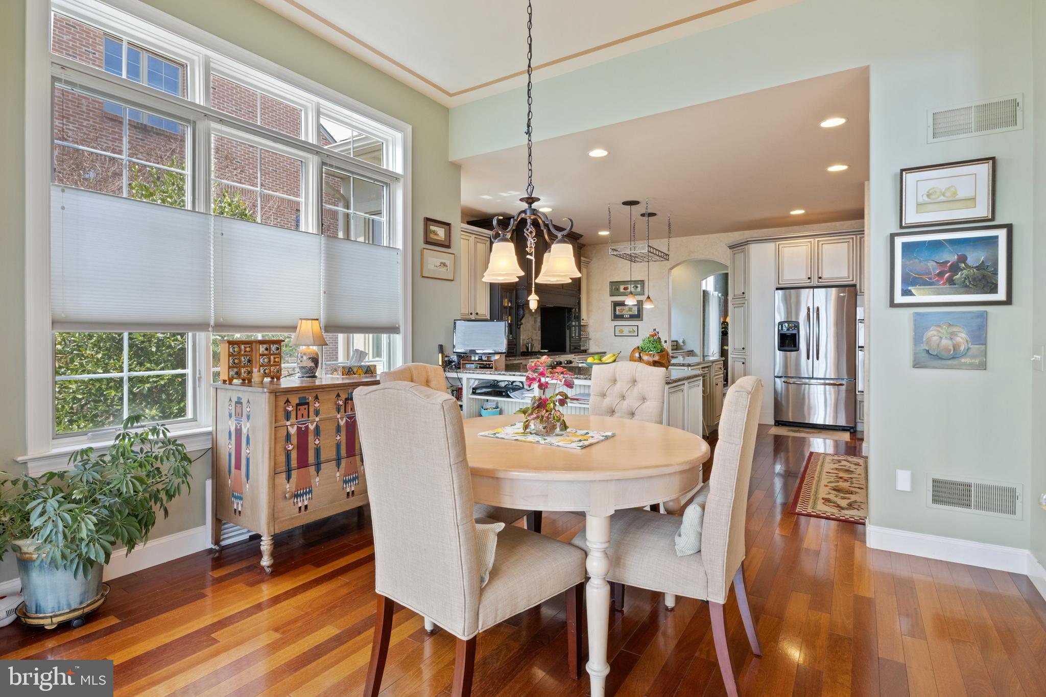 108 Valmere Path York, PA 17403 - Photo 16 of 84 a dining room with furniture window and wooden floor