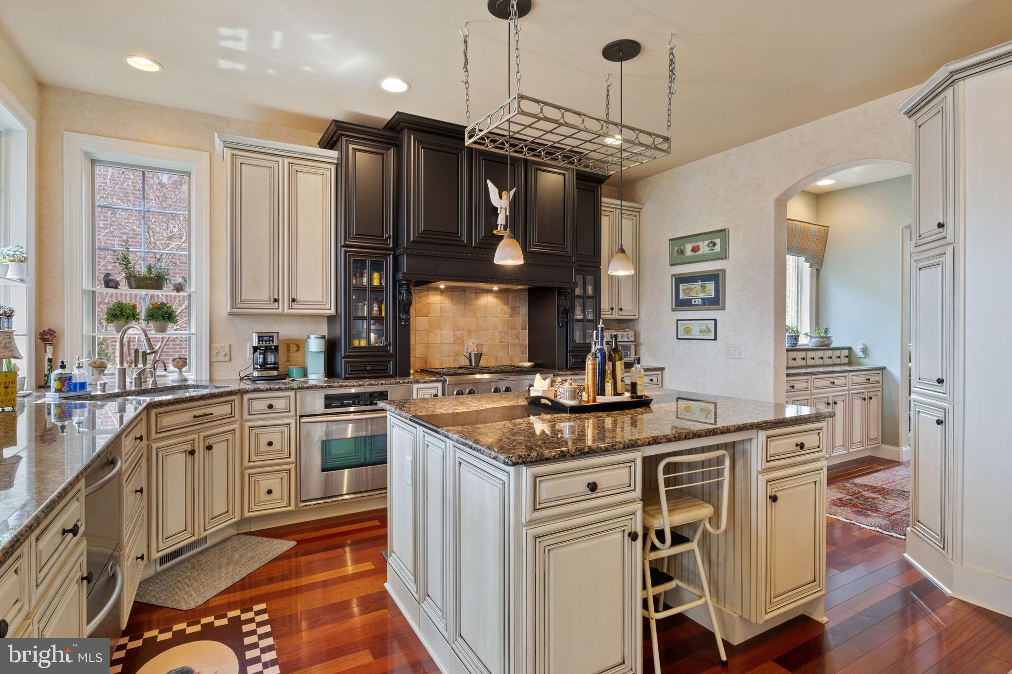 108 Valmere Path York, PA 17403 - Photo 21 of 84 a kitchen with stainless steel appliances granite countertop a sink stove and refrigerator