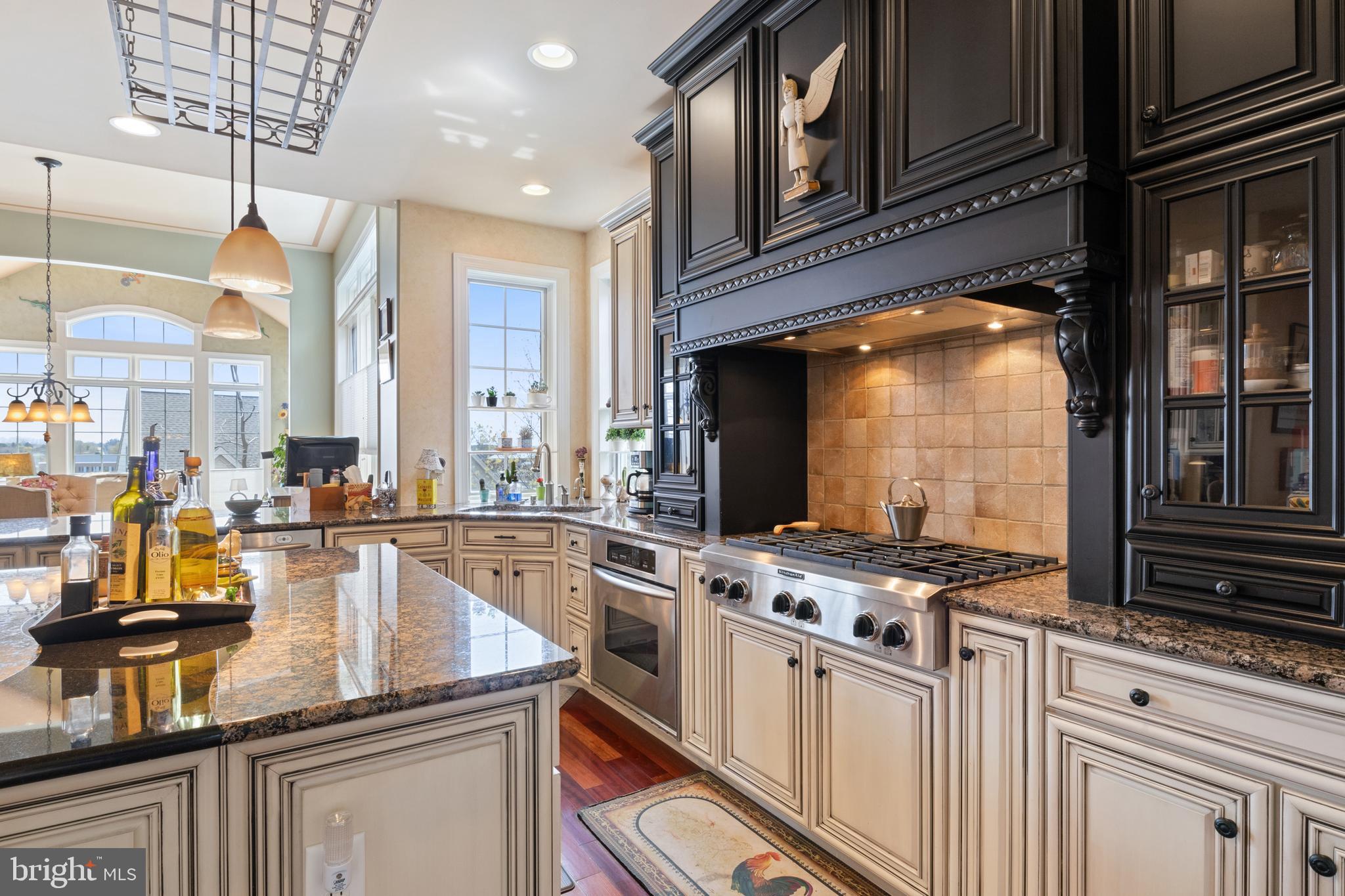 108 Valmere Path York, PA 17403 - Photo 22 of 84 a kitchen with stainless steel appliances granite countertop a stove and a sink
