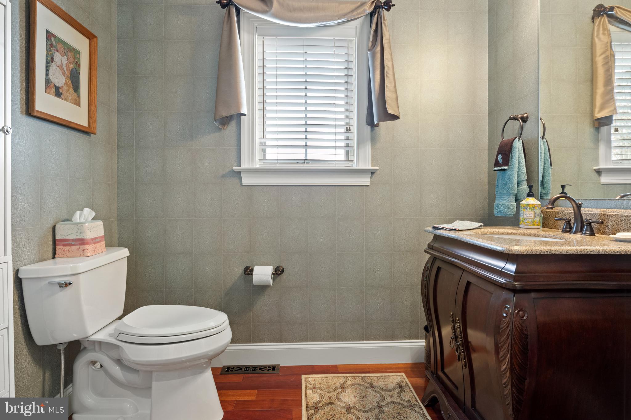 108 Valmere Path York, PA 17403 - Photo 32 of 84 a bathroom with a sink a toilet and a mirror