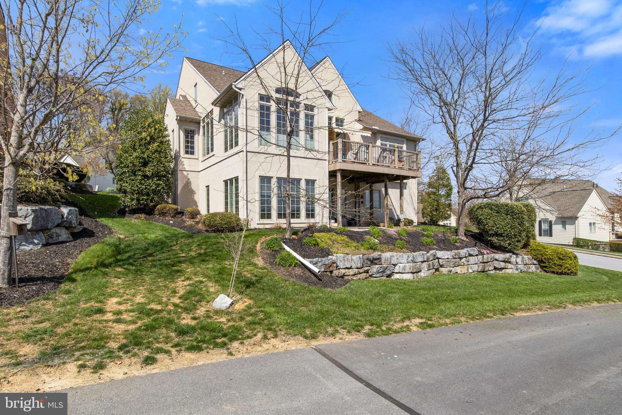 108 Valmere Path York, PA 17403 - Photo 63 of 84 a view of a white house with a yard plants and large tree
