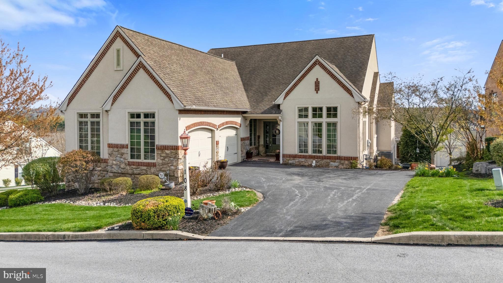 108 Valmere Path York, PA 17403 - Photo 66 of 84 a front view of a house with a yard and garage