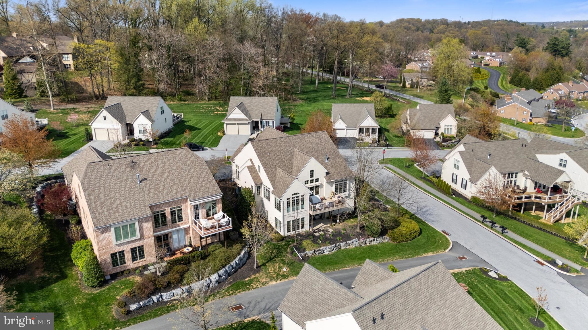 108 Valmere Path York, PA 17403 - Photo 71 of 84 an aerial view of a house with a garden and lake view