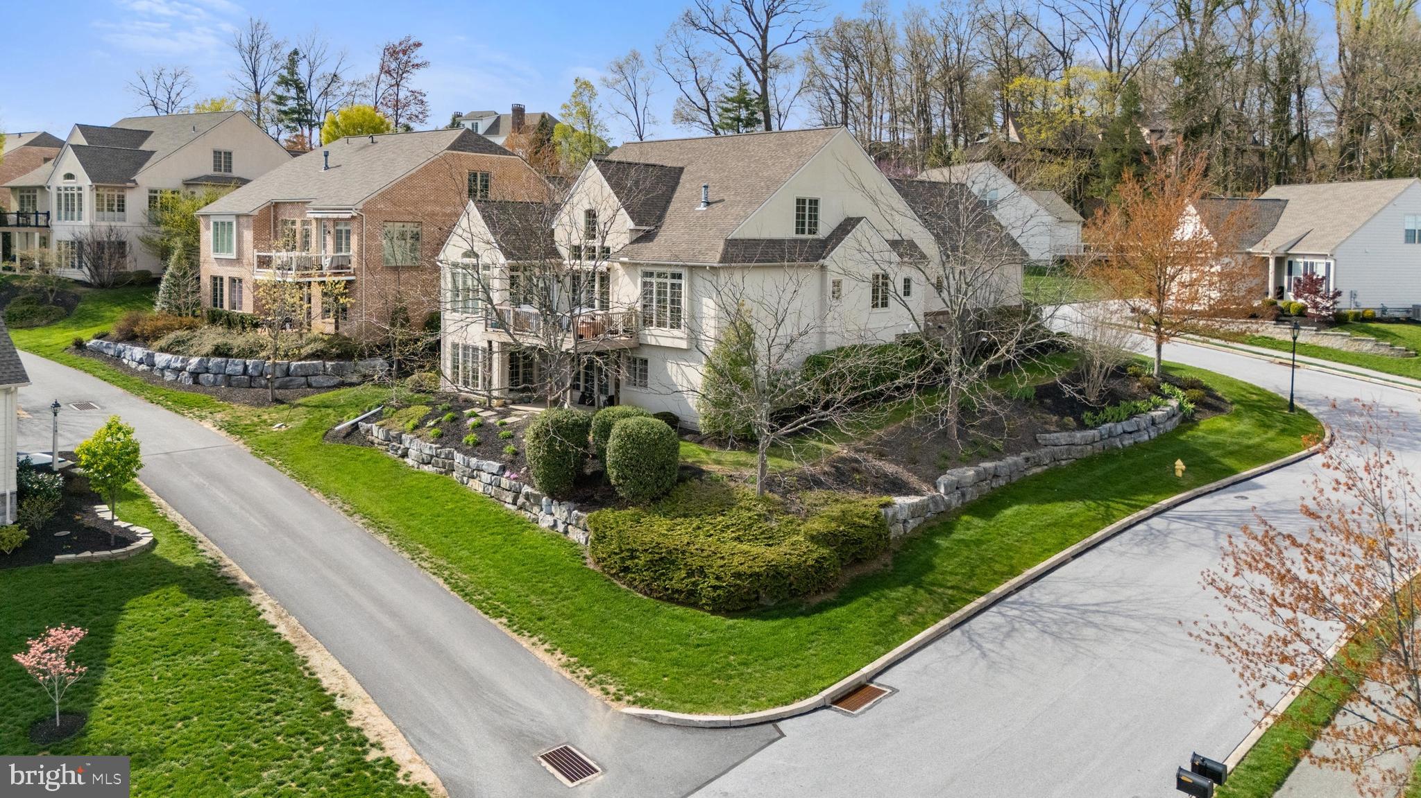108 Valmere Path York, PA 17403 - Photo 79 of 84 a view of a white house with a big yard plants and large trees