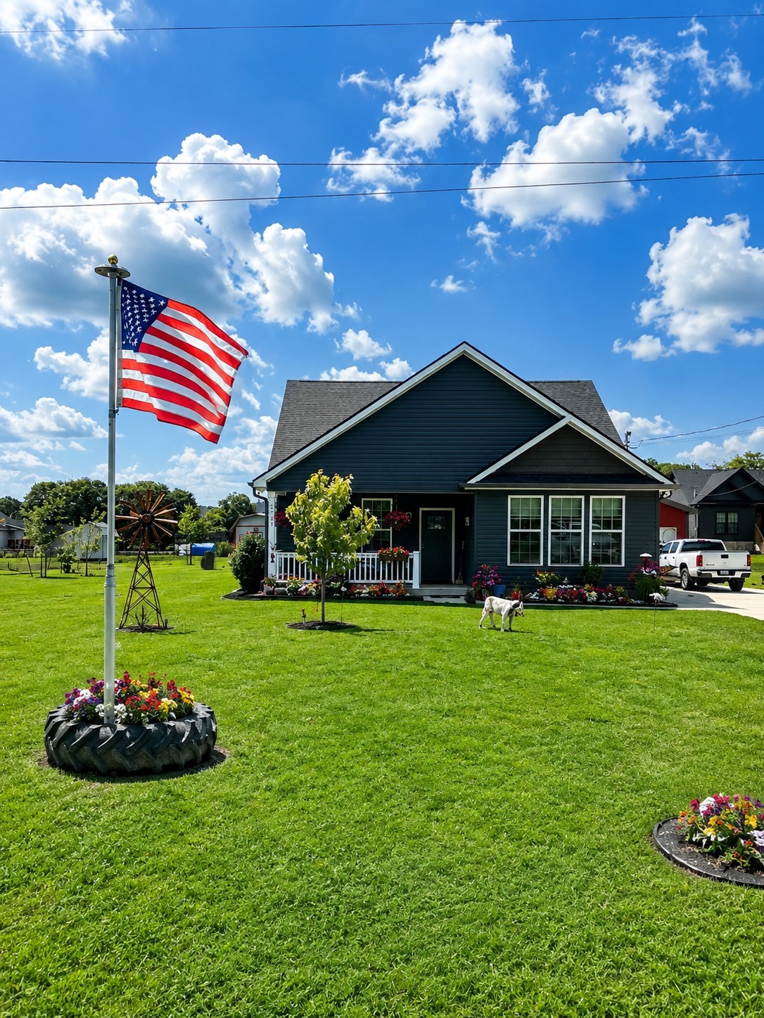 2705 Mc Connell Road Cornersville, TN 37047 - Photo 2 of 41 a front view of a house with garden