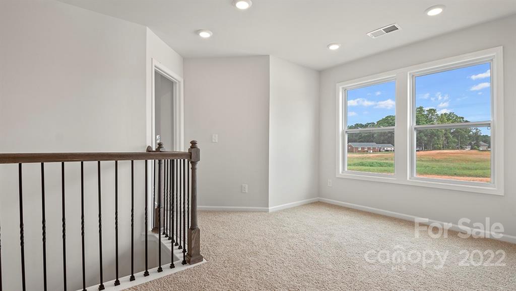 70 Creekview Road Hendersonville, NC 28792 - Photo 15 of 27 a view of an empty room with a window