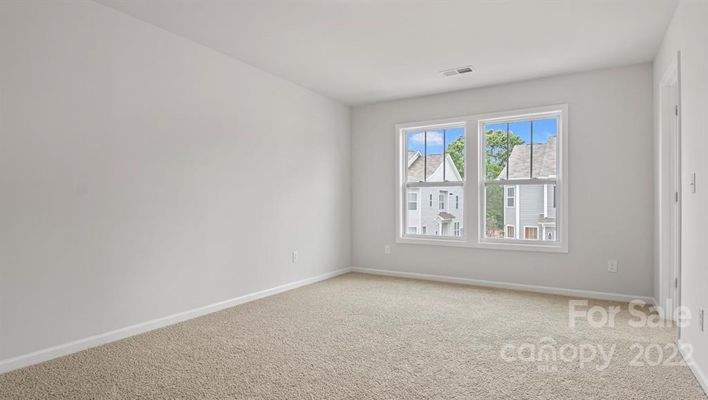 70 Creekview Road Hendersonville, NC 28792 - Photo 23 of 27 an empty room with a window