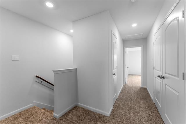 1226 Parker Drive Princeton, TX 75407 - Photo 10 of 35 Hall with carpet floors, an upstairs landing, and recessed lighting