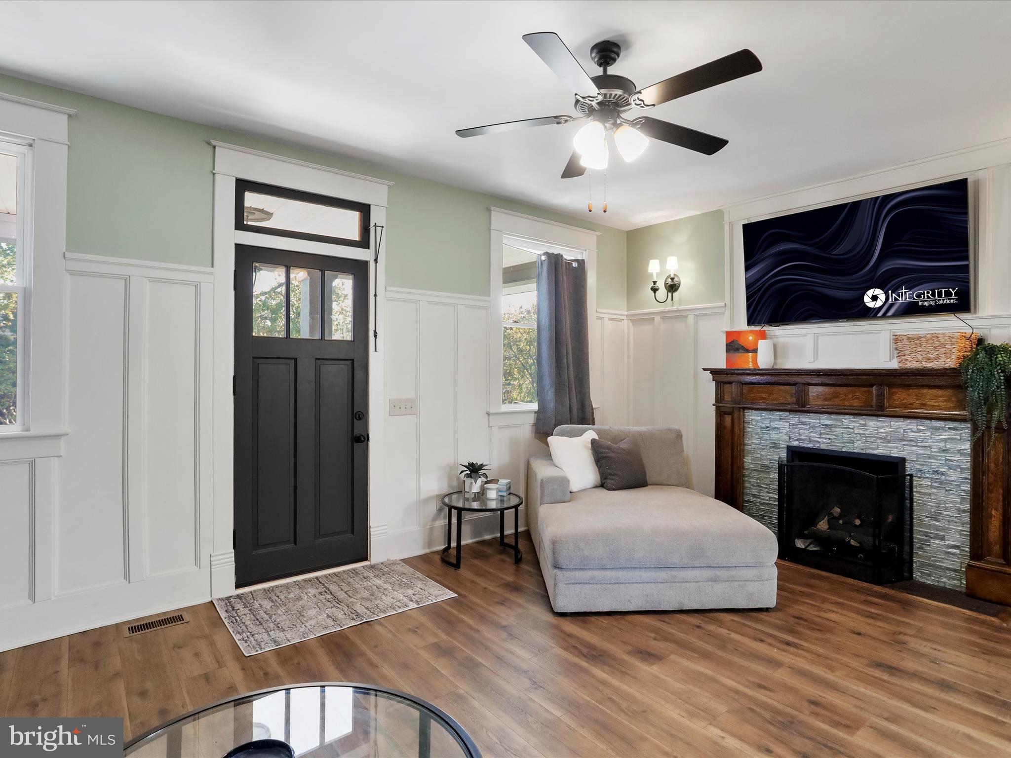 504 Prince George Street Cumberland, MD 21502 - Photo 11 of 33 a living room with furniture and a fireplace