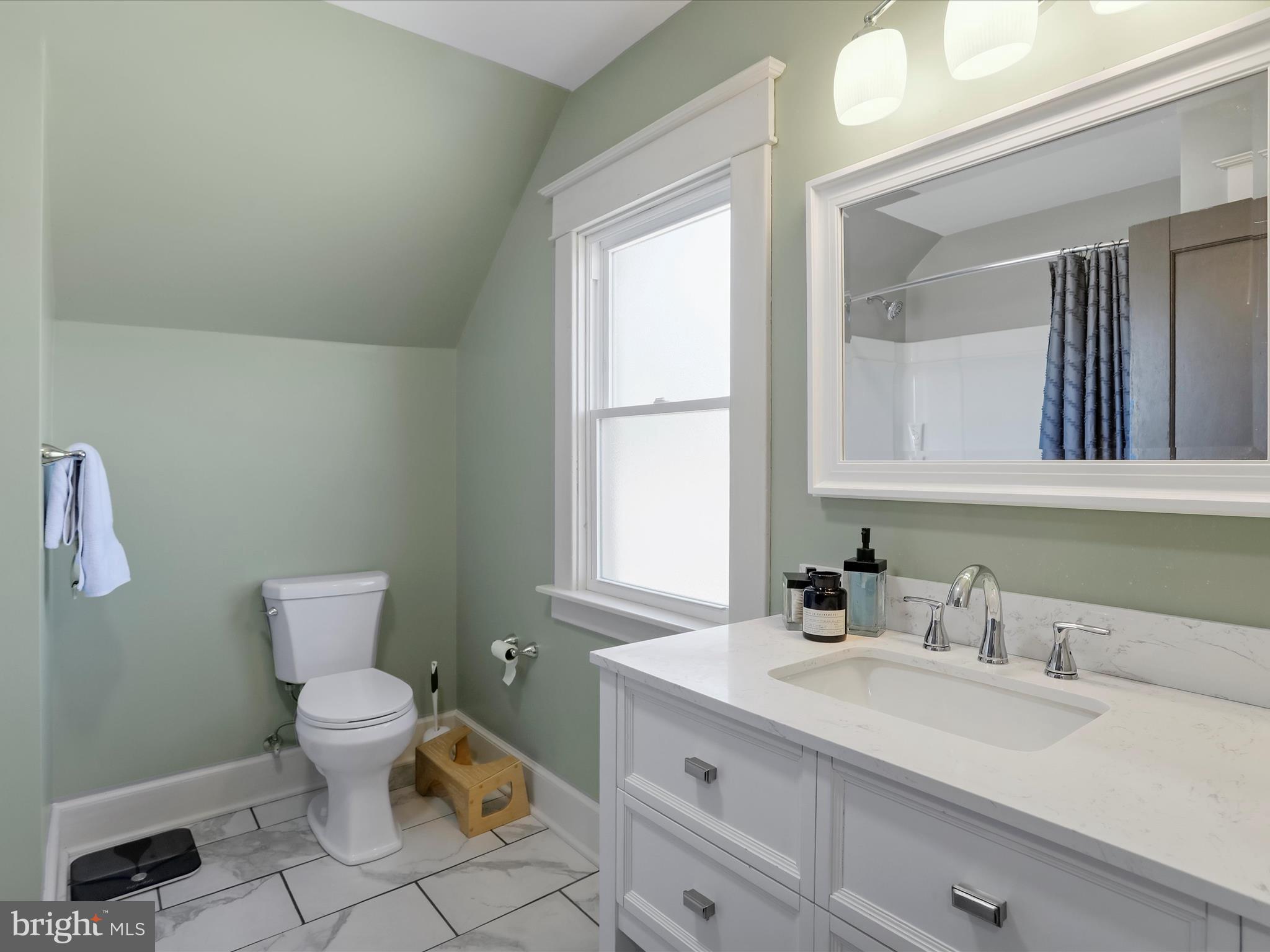 504 Prince George Street Cumberland, MD 21502 - Photo 21 of 33 a bathroom with a granite countertop toilet sink and mirror