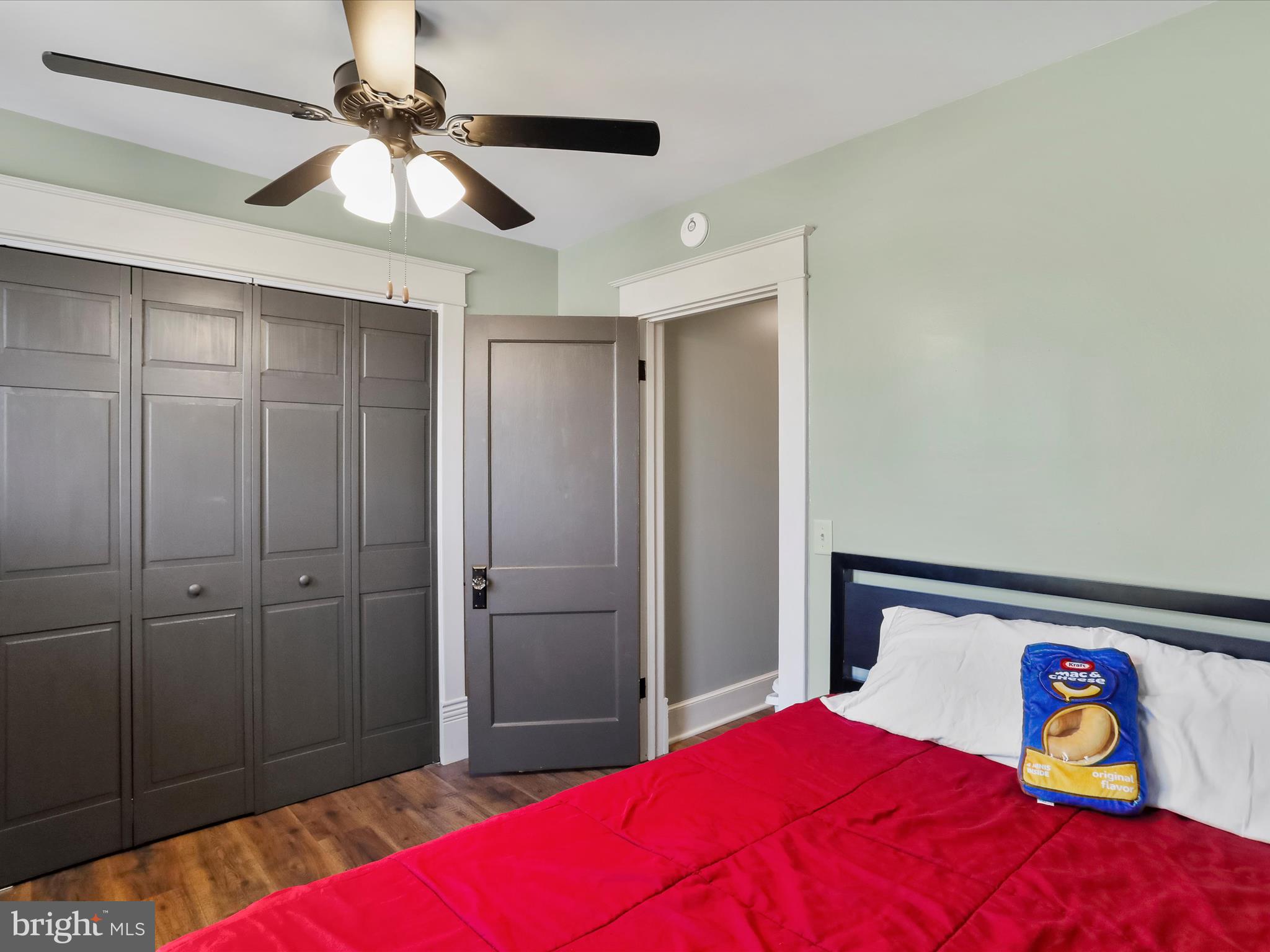 504 Prince George Street Cumberland, MD 21502 - Photo 25 of 33 a bedroom with a bed and a chandelier