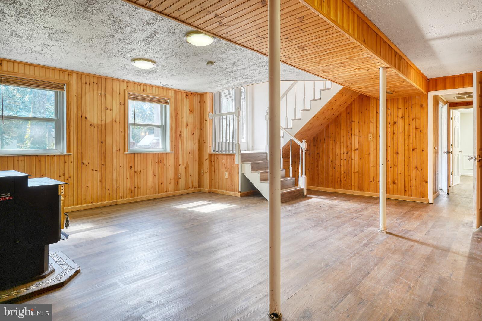 1142 Calvert Beach Road St. Leonard, MD 20685 - Photo 39 of 63 wooden floor in an empty room with a window