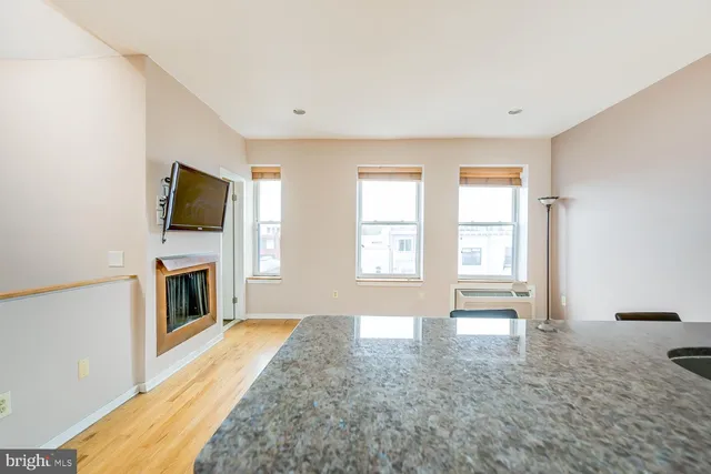 a view of livingroom with furniture and fireplace
