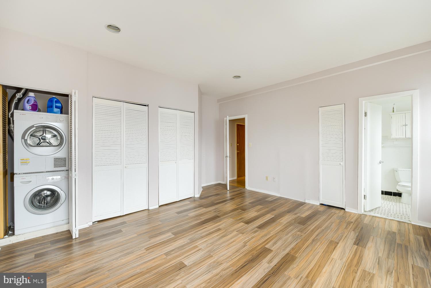 2300 18th Street Northwest, Unit 301 Washington, DC 20009 - Photo 17 of 20 a view of empty room with wooden floor and window