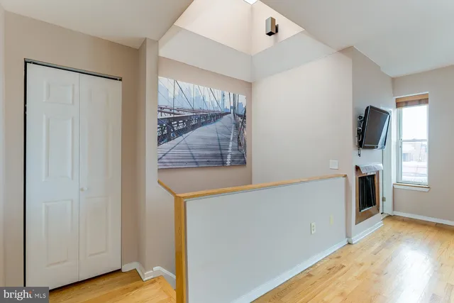 a view of kitchen with furniture and wooden floor