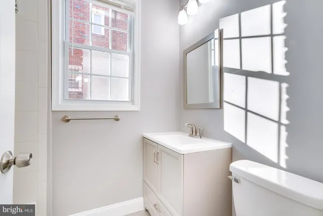 a bathroom with a sink and a toilet