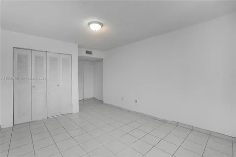 a bathroom with a shower and a toilet