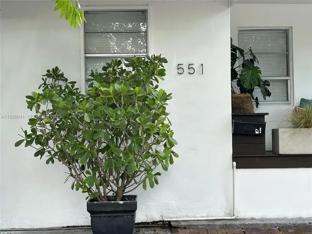 a vase of flowers sitting on a table