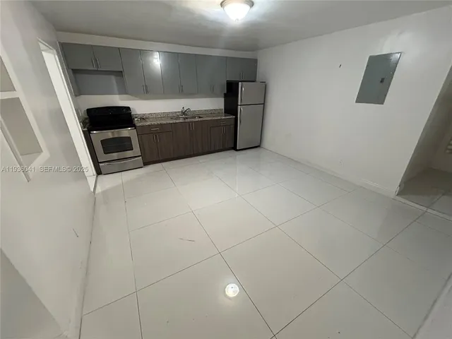 a view of a storage & utility room with washer and dryer