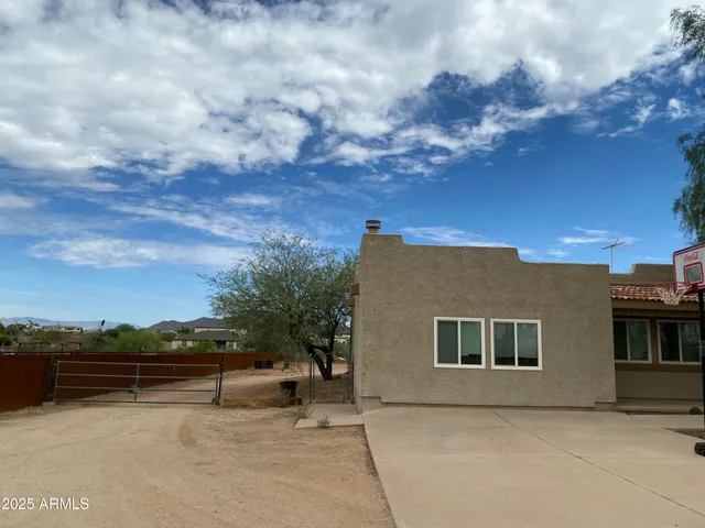 a view of house with outdoor space