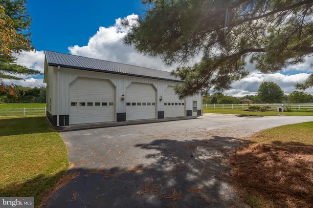 a view of swimming pool with a patio