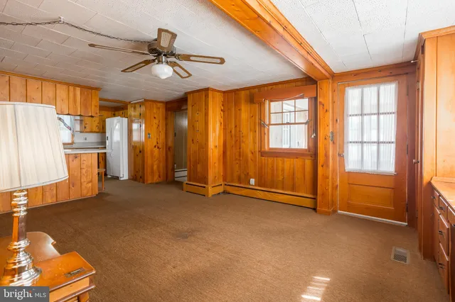 a view of an empty room and window