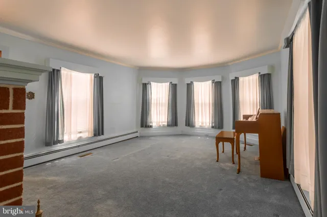 a room with furniture and a window