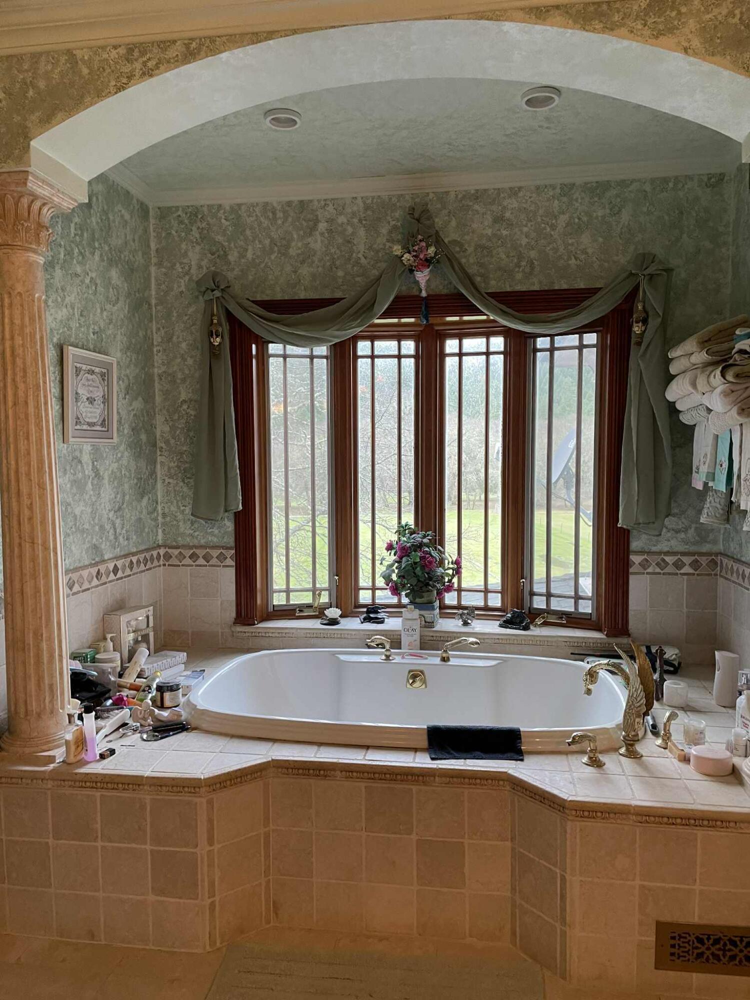 1100 McMullen Creek Road Selma, OR 97538 - Photo 8 of 25 a bathroom with a sink mirror and window