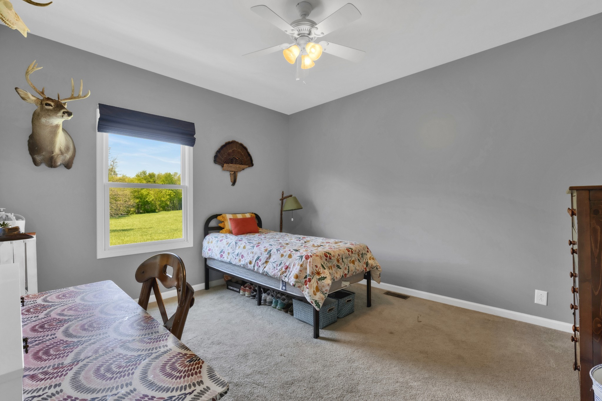 3988 Fykes Grove Road Cedar Hill, TN 37032 - Photo 24 of 50 a bedroom with a bed and a window