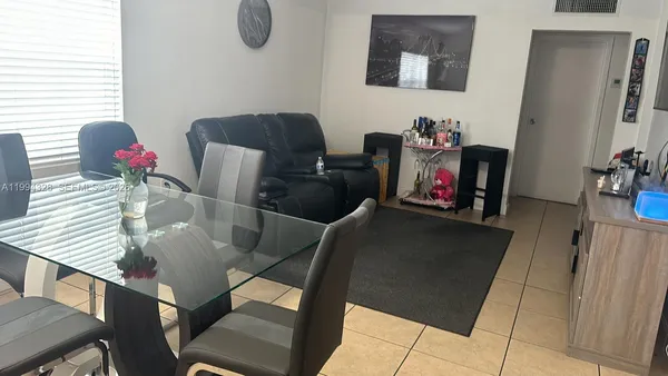 a view of livingroom with furniture and wooden floor