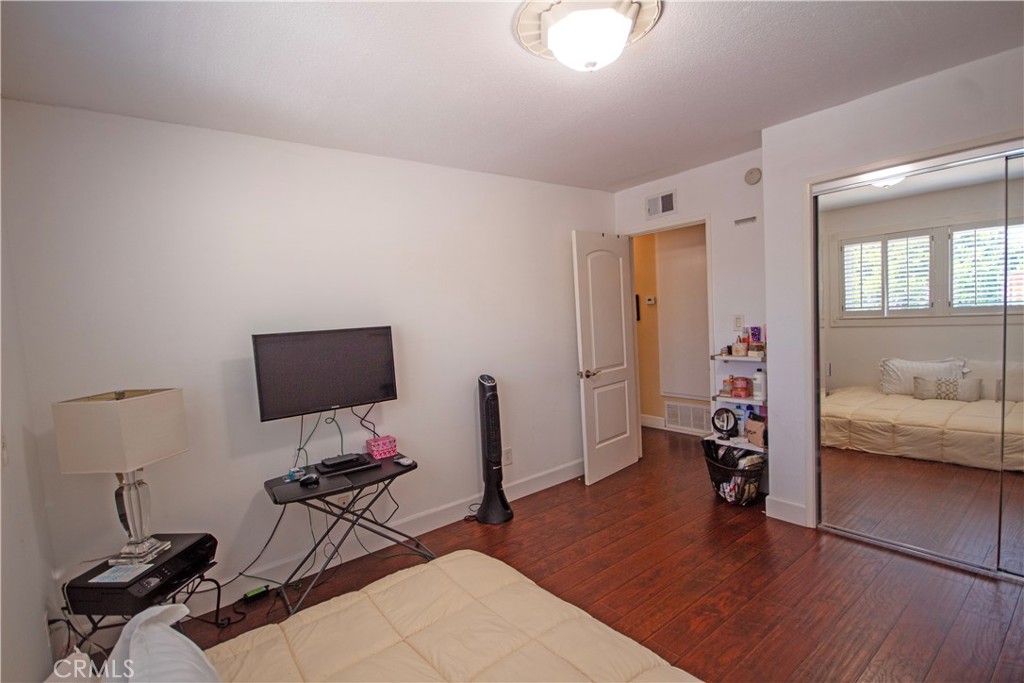 24230 Postmaster Avenue Harbor City, CA 90710 - Photo 14 of 31 a view of a livingroom with furniture and a flat screen tv
