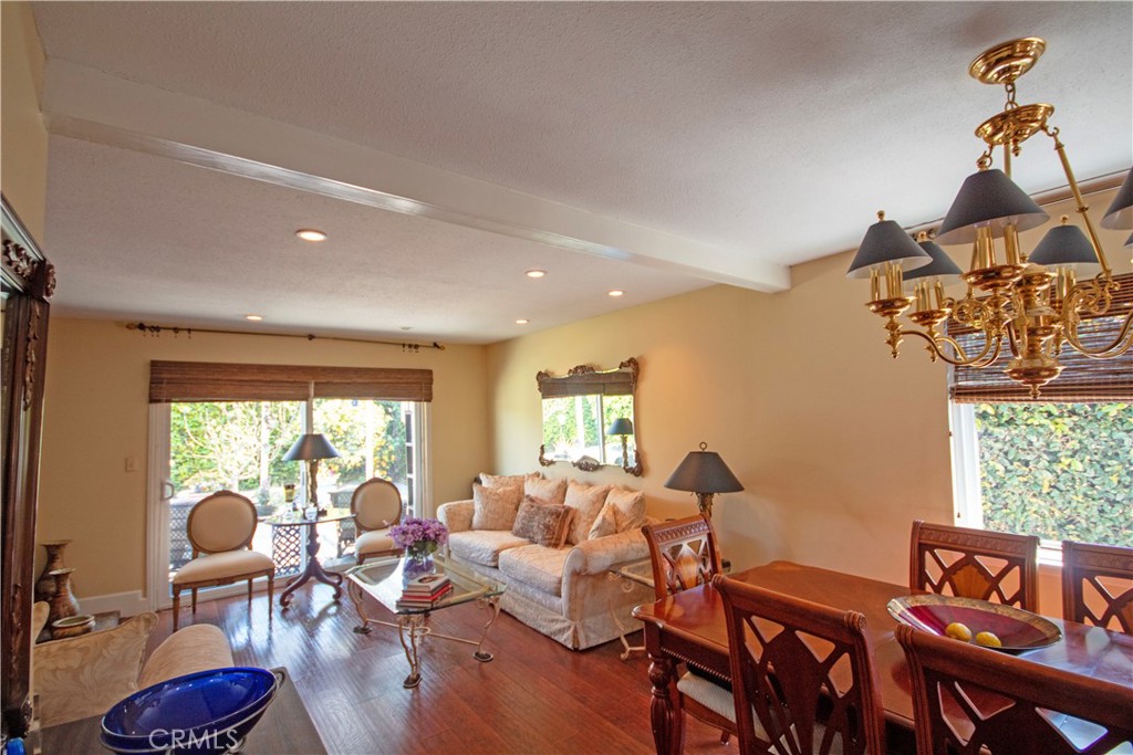 24230 Postmaster Avenue Harbor City, CA 90710 - Photo 23 of 31 a living room with furniture and floor to ceiling windows