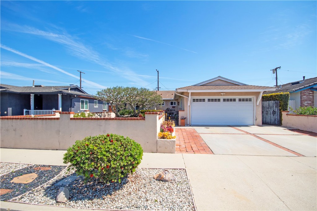 24230 Postmaster Avenue Harbor City, CA 90710 - Photo 30 of 31 a front view of a house with garden