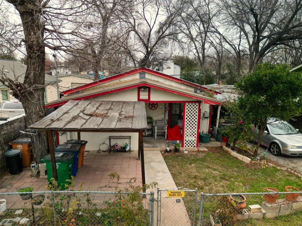 2900 Castro Street Austin, TX 78702 - Photo 3 of 39 a front view of a house with garden