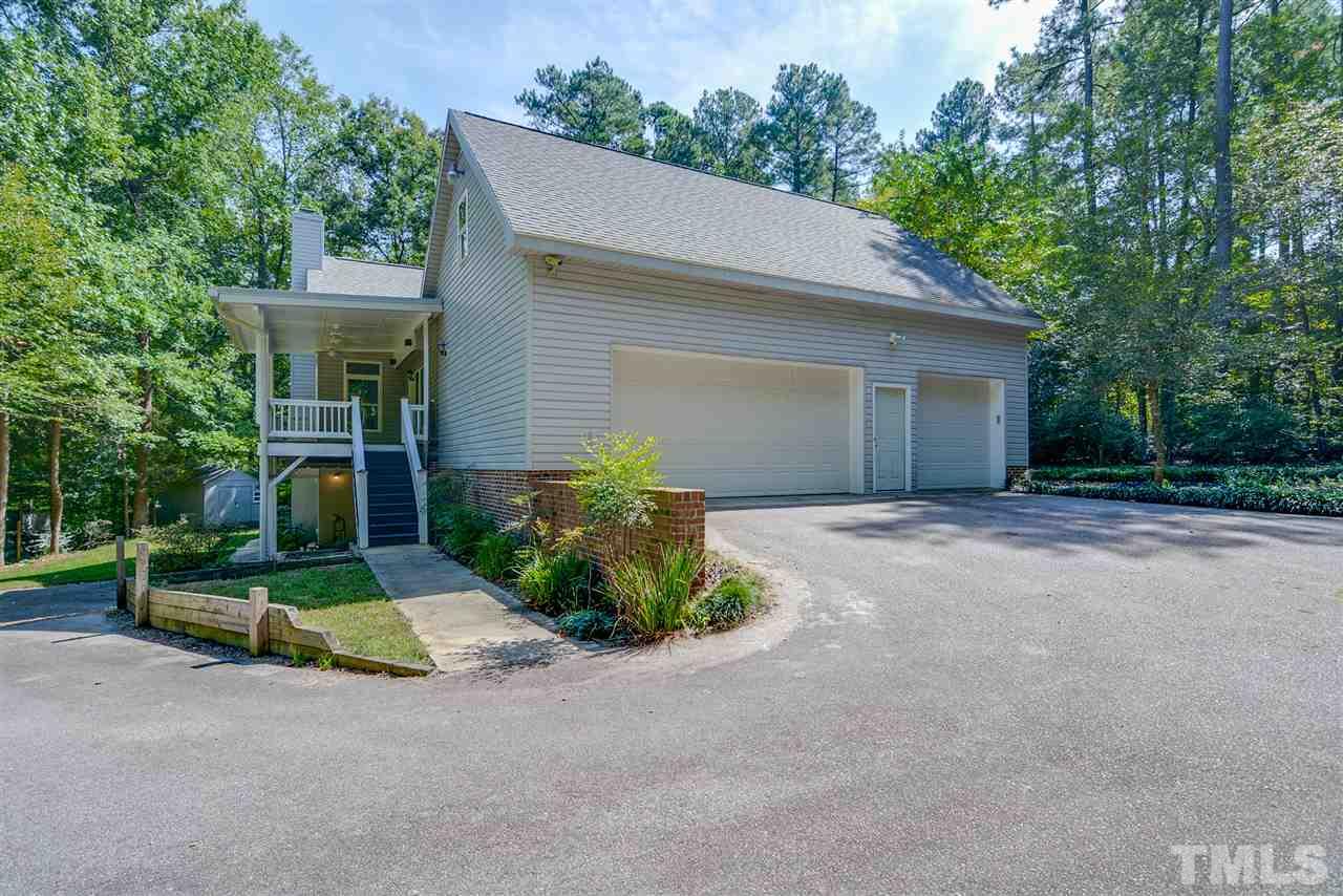 12925 Ghoston Road Wake Forest, NC 27587 - Photo 2 of 24 4 car garage. 3 on main level. 4th on basement level. Perfect for car projects, boat...