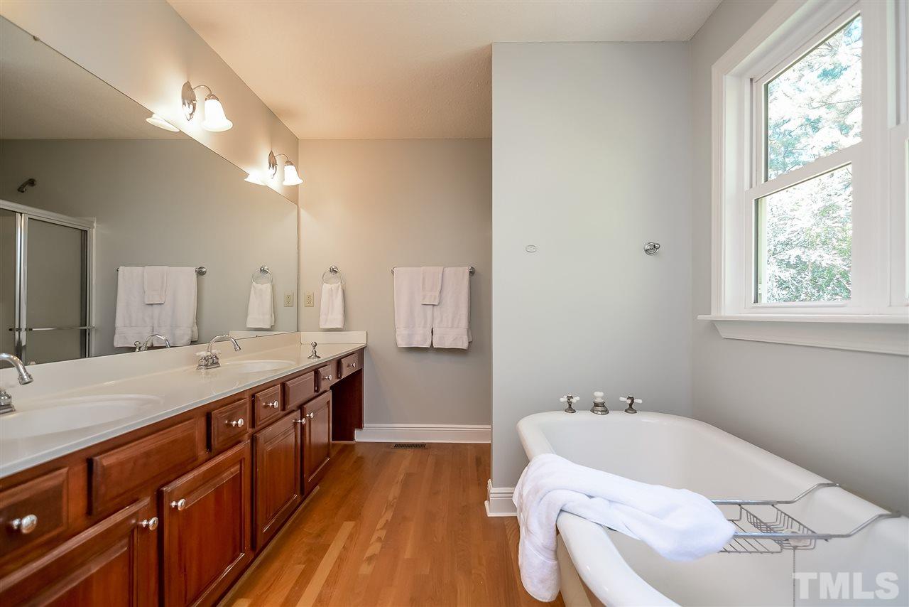 12925 Ghoston Road Wake Forest, NC 27587 - Photo 15 of 24 Dual Sink Vanity. Shower with separate claw foot tub.